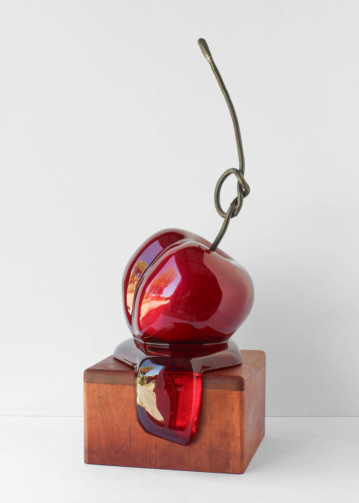 Good Kisser #14 by Olivia Bonilla — original automotive paint, foam, plaster, resin, and forged steel sculpture on a cherry wood base, 10×18×10 in. Midnight Gallery.