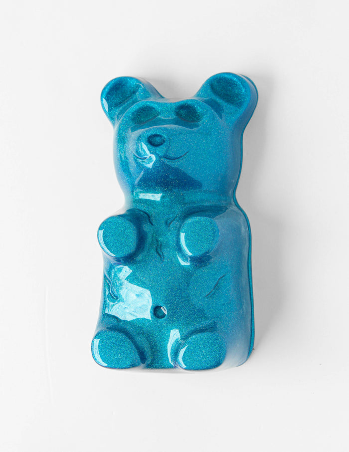 Electric Blue Gummy Bear by Olivia Bonilla — original plaster, automotive paint, and resin sculpture, 5×10×5 in. Midnight Gallery.