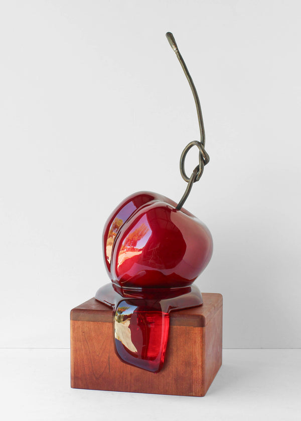Good Kisser #14 by Olivia Bonilla — original automotive paint, foam, plaster, resin, and forged steel sculpture on a cherry wood base, 10×18×10 in. Midnight Gallery.
