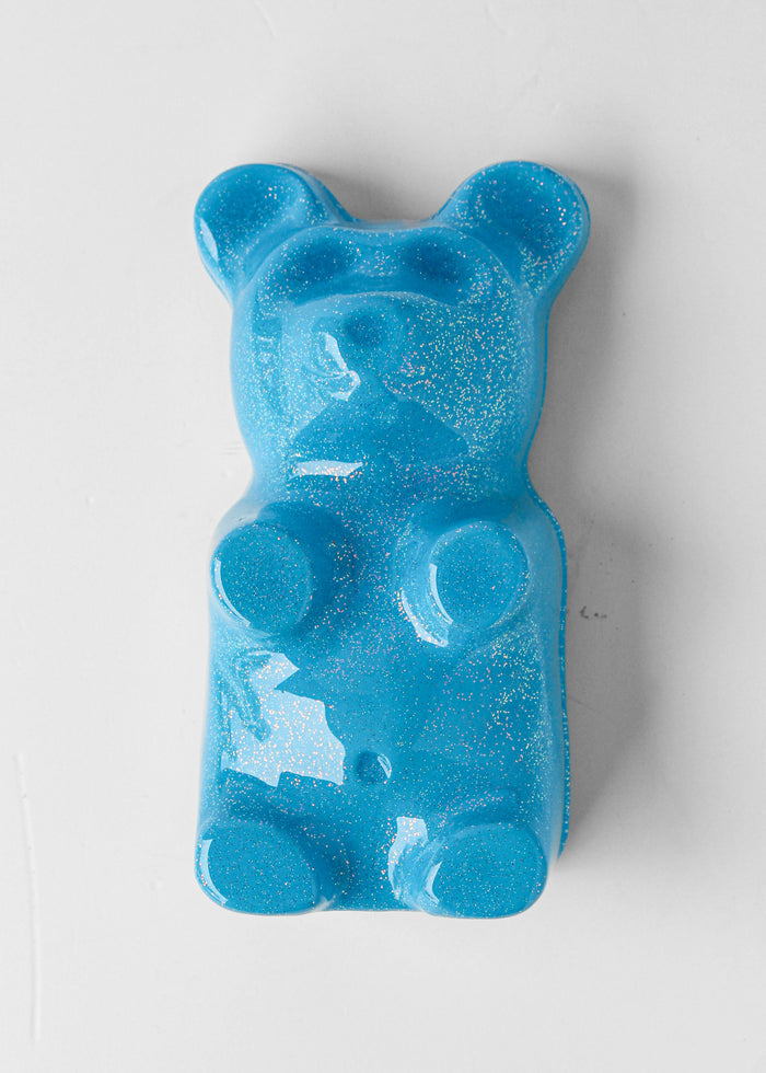 Ice Blue Gummy Bear by Olivia Bonilla — original plaster, automotive paint, and resin sculpture, 5×10×5 in. Midnight Gallery.