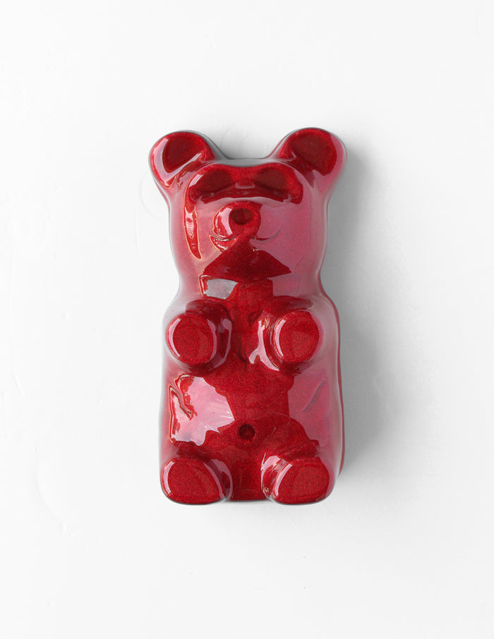 Ruby Red Gummy Bear by Olivia Bonilla — original plaster, automotive paint, and resin sculpture, 5×10×5 in. Midnight Gallery.