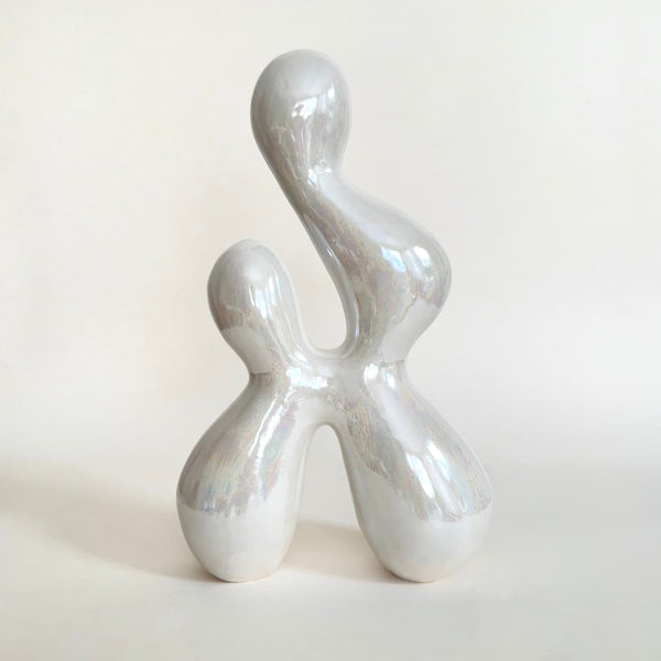 Sleek by Emily Meisler — original glazed ceramic sculpture, 7×12×3 in. Midnight Gallery.