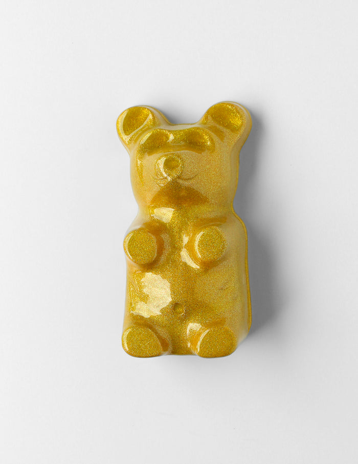 Sun Burst Gummy Bear by Olivia Bonilla — original plaster, automotive paint, and resin sculpture, 5×10×5 in. Midnight Gallery.