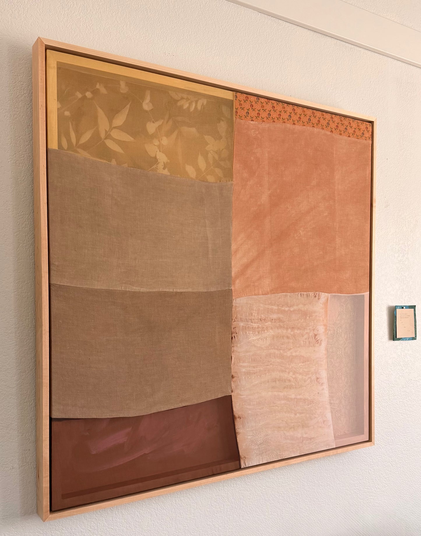 The Virtue of Inquisitiveness by Kristen Abbott — original cyanotype and sewn textiles on cradled wood panel, 42×42×2 in, framed. Midnight Gallery.