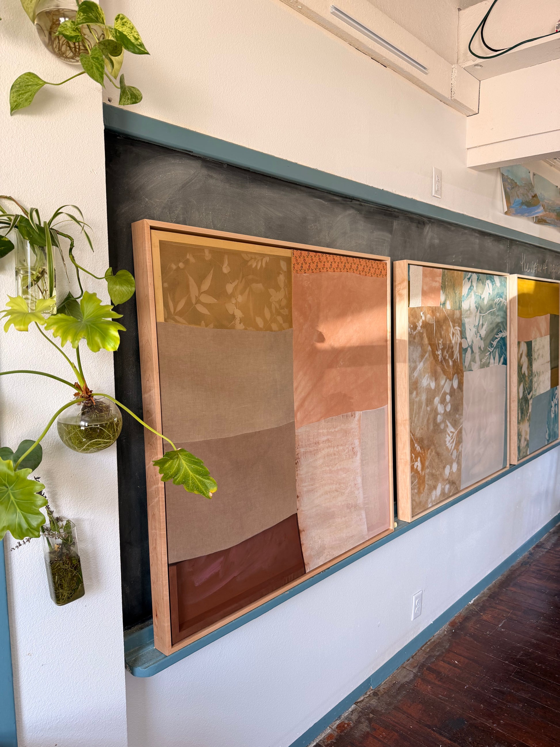 The Virtue of Inquisitiveness by Kristen Abbott — original cyanotype and sewn textiles on cradled wood panel, 42×42×2 in, framed. Midnight Gallery.