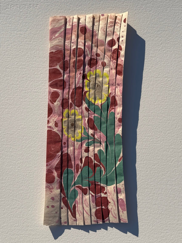 Ebru Pleat XI by Morgan Elvington Walker — original marbling on pleated newsprint paper, 5×13 in. Midnight Gallery.