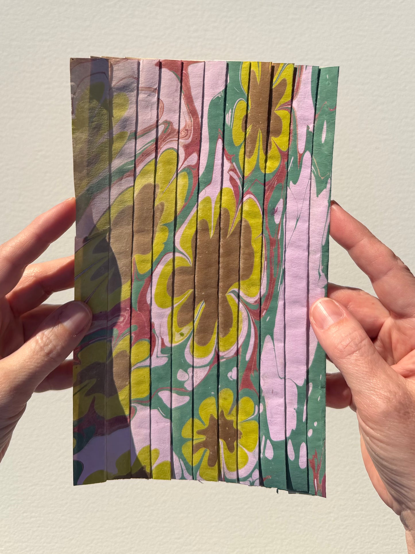 Ebru Pleat XII by Morgan Elvington Walker — original marbling on pleated newsprint paper, 6×9 in. Midnight Gallery.